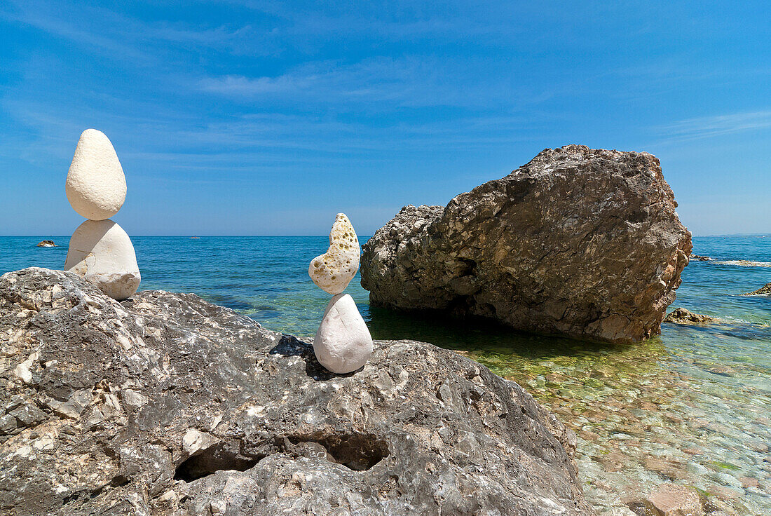 Conero, Marche, Italy. On the beach of Sassi Neri (black stones)