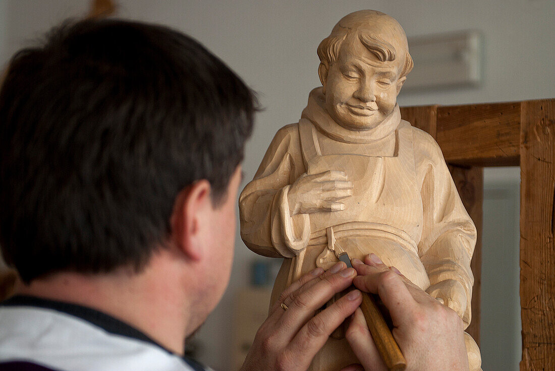 Gardena Valley, South Tyrol, Italy. Sculptor of wood to his work