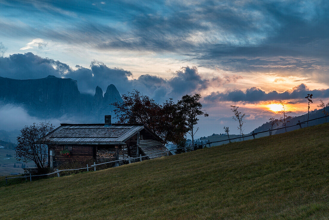 Alpe di SiusiSeiser Alm, Dolomites, South Tyrol, Italy. Sunset on the Alpe di SiusiSeiser Alm with the SciliarSchlern