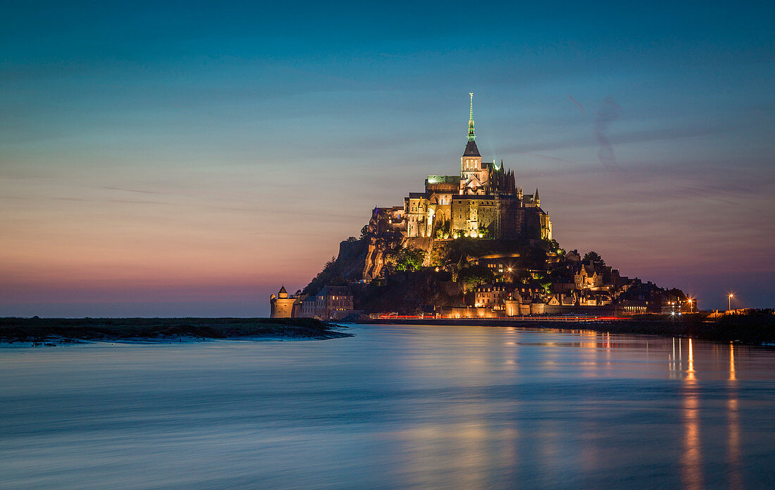 Le Mont Saint Michel, Normandy, Francce. Sunset among the seaside.