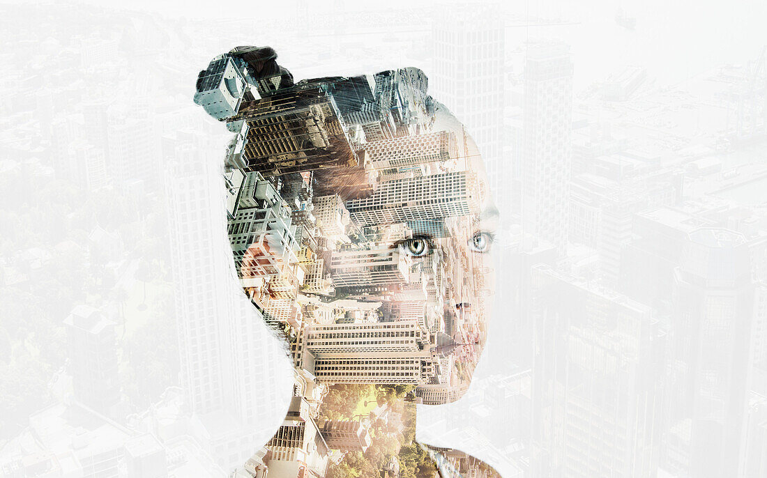 Double exposure of mixed race girl and cityscape