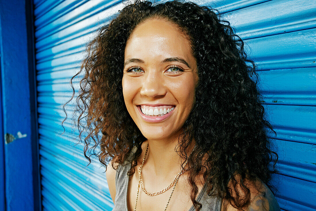 Mixed race woman smiling