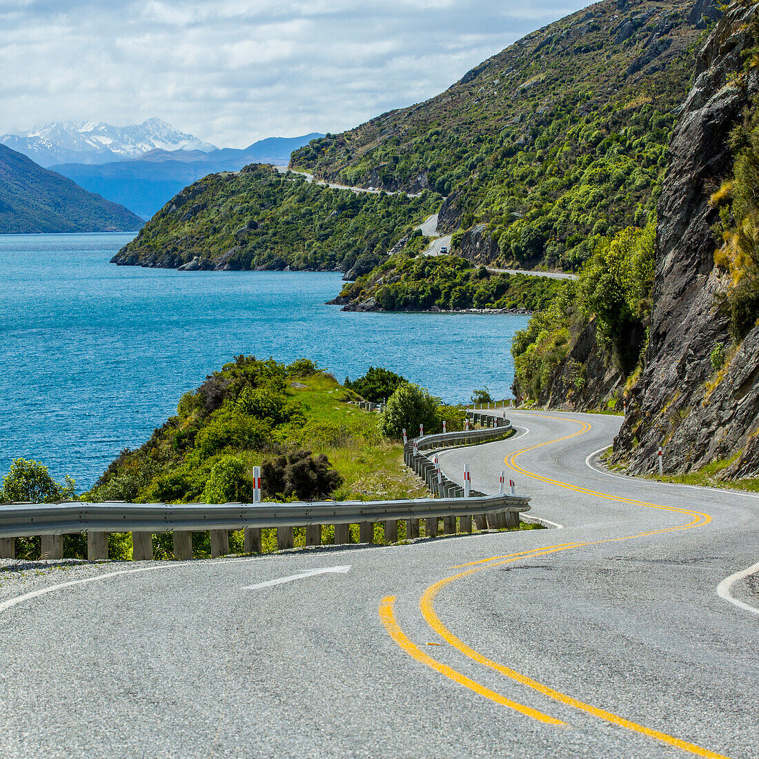 Highway on remote mountains near lake, Queenstown, Otago, New Zealand