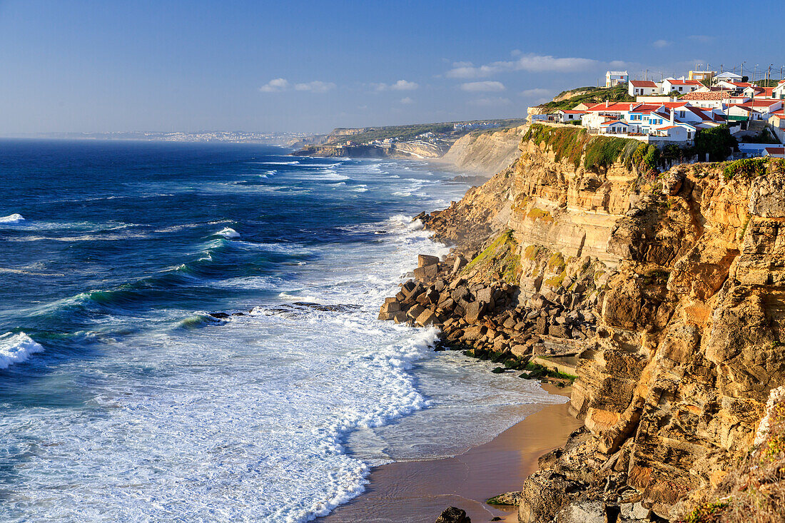 Top view of ocean waves crashing on the high cliffs of Azenhas do Mar, Sintra, Portugal, Europe