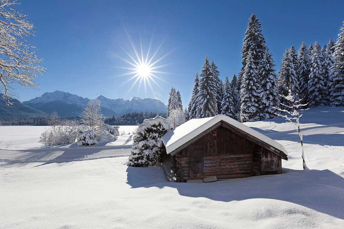 Winter landscape at Barmsee, view to Soiern range and Karwendel range, Bavaria, Germany