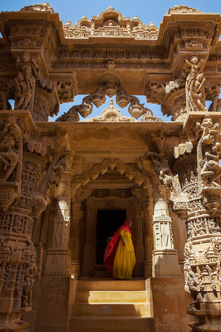 Indian lady in traditional dress in a temple in Jaisalmer, Rajasthan, India, Asia