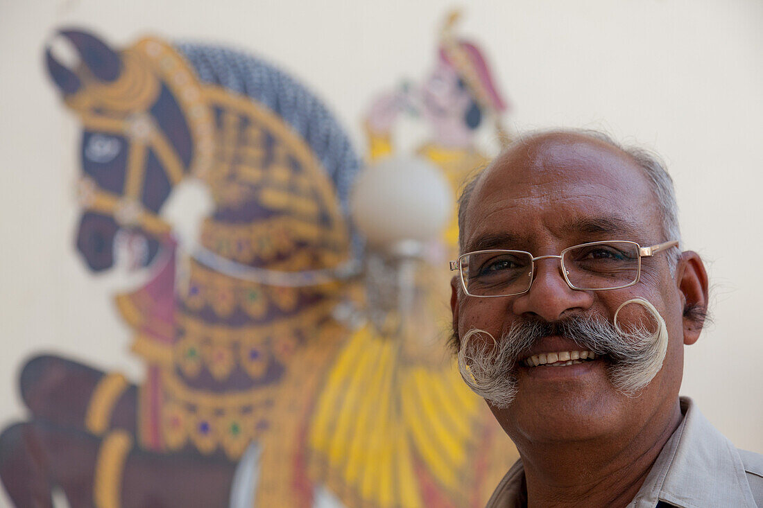 Guard with fine curly moustache, City Palace, Udaipur, Rajasthan, India, Asia