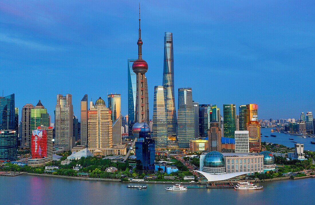 China, Shanghai City, Pudong Skyline, ,Oriental Pearl, World Financial Center and Shanghai Towers, Huangpu River.