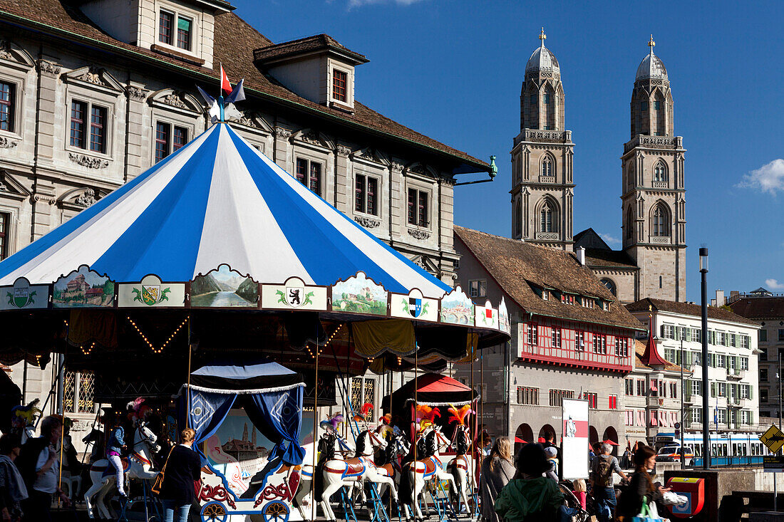 Carousel on Rathausbrücke and Grossmünster Church, Zurich, Switzerland