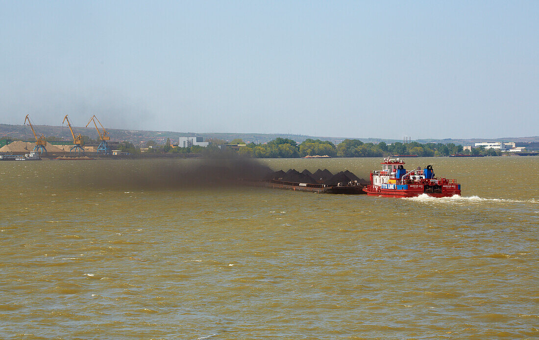 Freighter carrying coal near Silistra , River Danube , Bulgaria , Europe