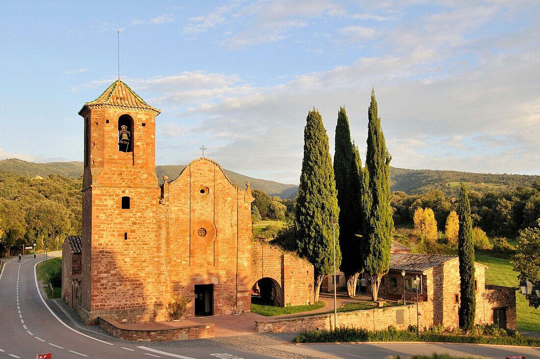 'Church of Sant Martí del Brull, located in the center of the town of El Brull; it is an 11th century Romanesque building well conserved outside, the bell tower and the West gate are from the 18th. Osona, Barcelona province, Catalonia, Spain'