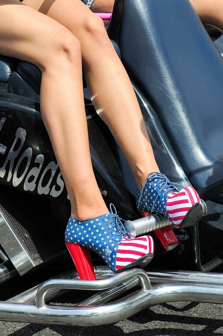 Concentration of Harley Davidson motorcycles. USA flag shoes. Barcelona. Catalonia. Spain.