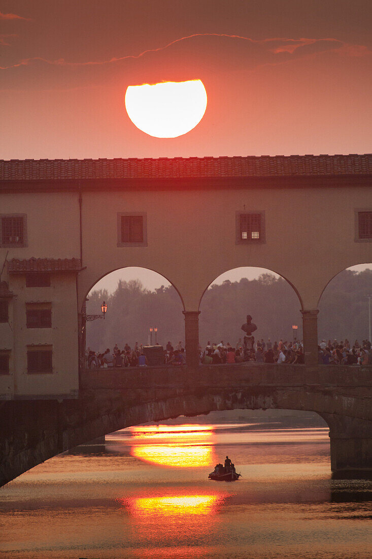 Europe, Italy, Tuscany, Florence, Ponte Vecchio at sunset and Arno river.