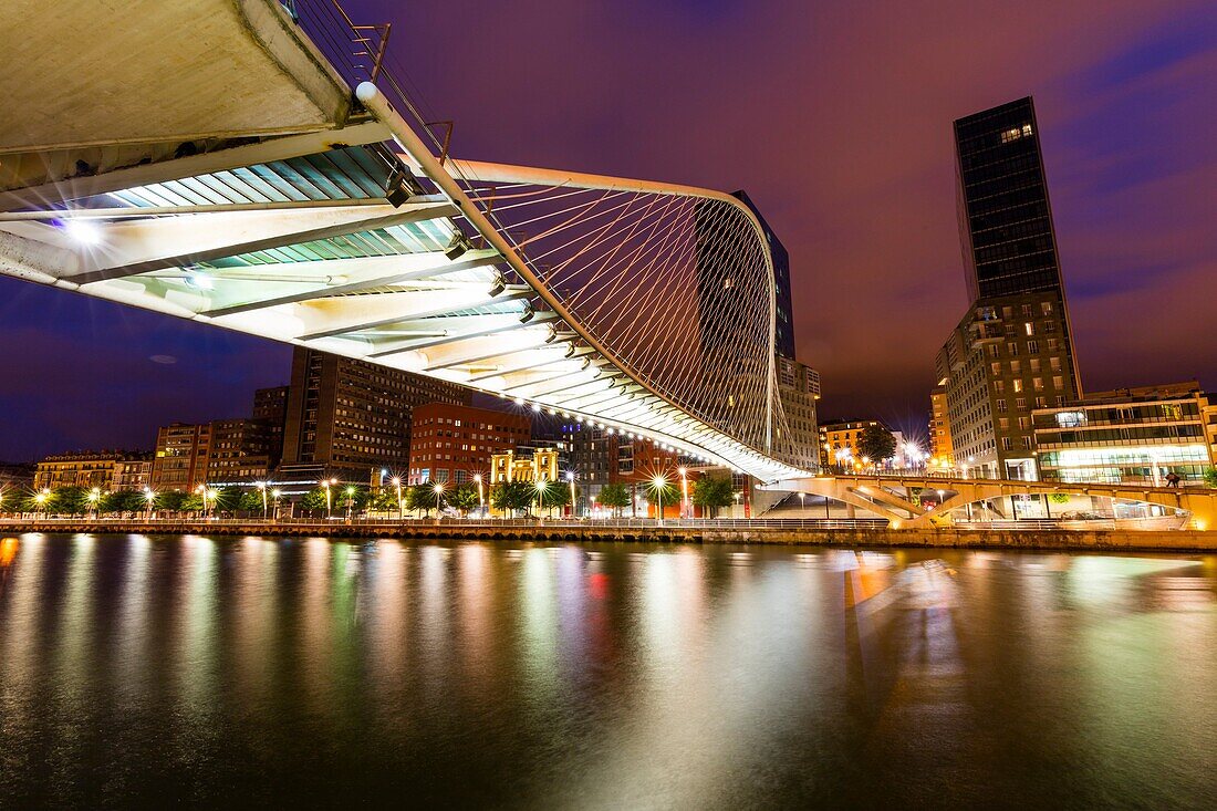 Zubizuri bridge and Isozaki Atea Towers. Bilbao, Bizkaia, Basque Country, Spain, Europe.