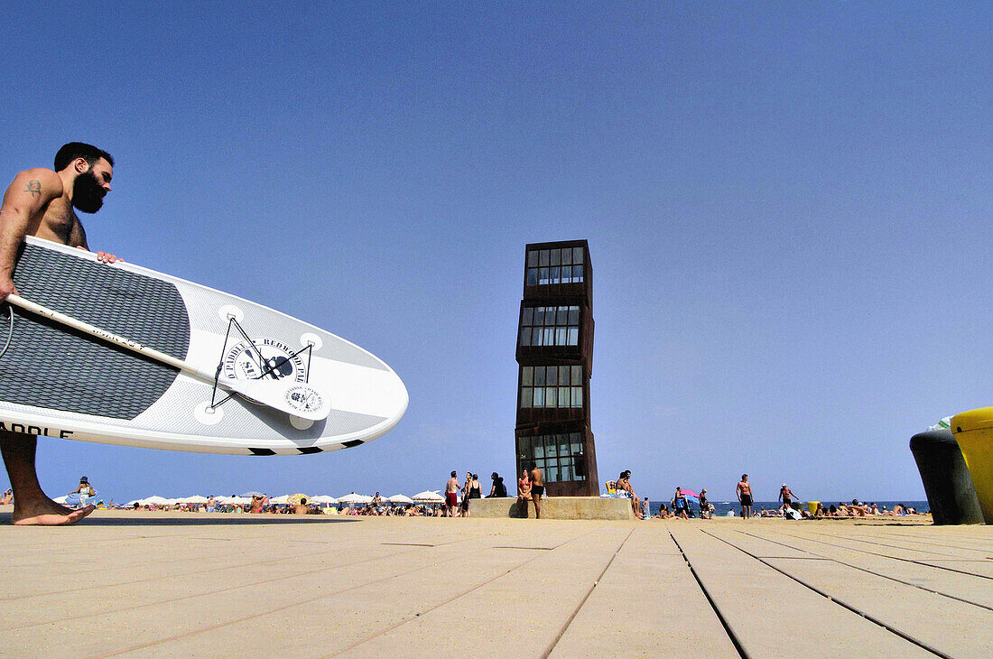 Surf board. Sculpture ´The wounded star´ L´estel ferit by Rebecca Horn at Barceloneta beach, 1992. Barcelona, Catalonia, Spain.