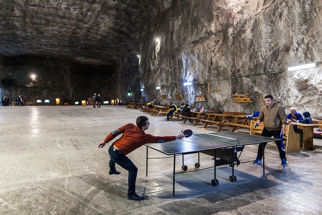 Romania, Transylvania, Praid, Praid Salt Mine, playing ping pong.