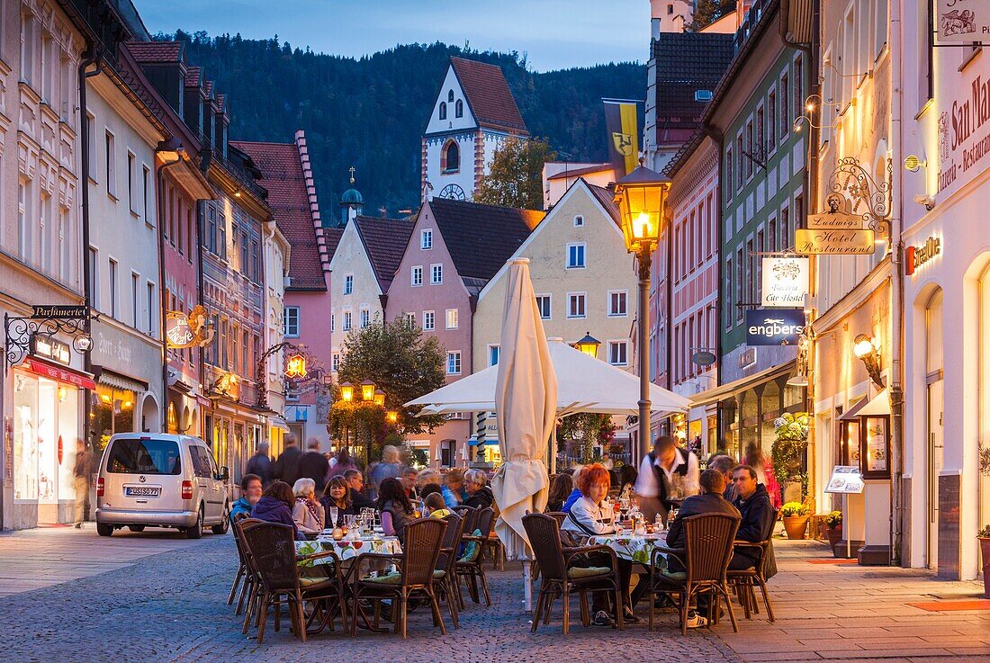 Germany, Bavaria, Fussen, Reichenstrasse, pedestrian street, dusk.