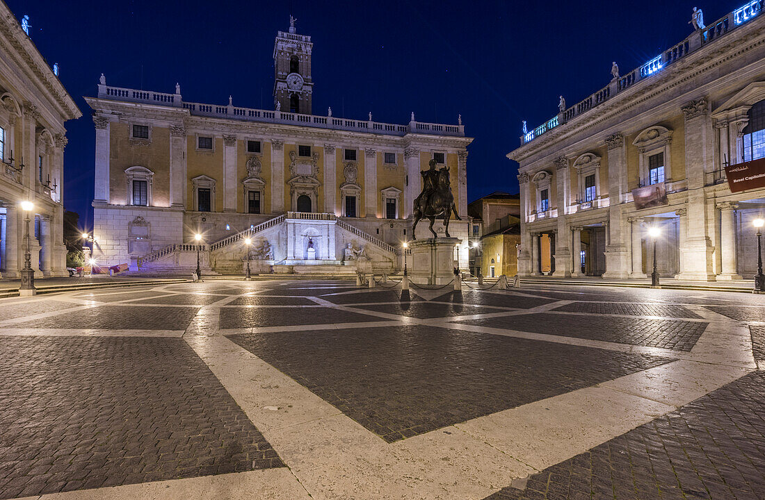 Capitoline Hill, Rome, Lazio, Italy. Piazza del Campidoglio by night with the replica of the equestrian statue of Marcus Aurelius.