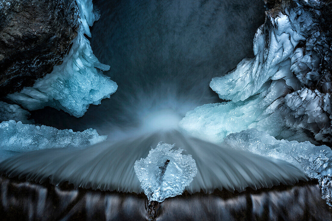 Aereal view from frozen waterfall from Smeraldo lake, Non Valley, Trentino Alto Adige, Italy.