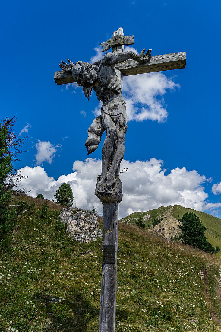 Wooden Cross carved in Ortisei, Gardena valley, Dolomites, Sudtirol, Italy