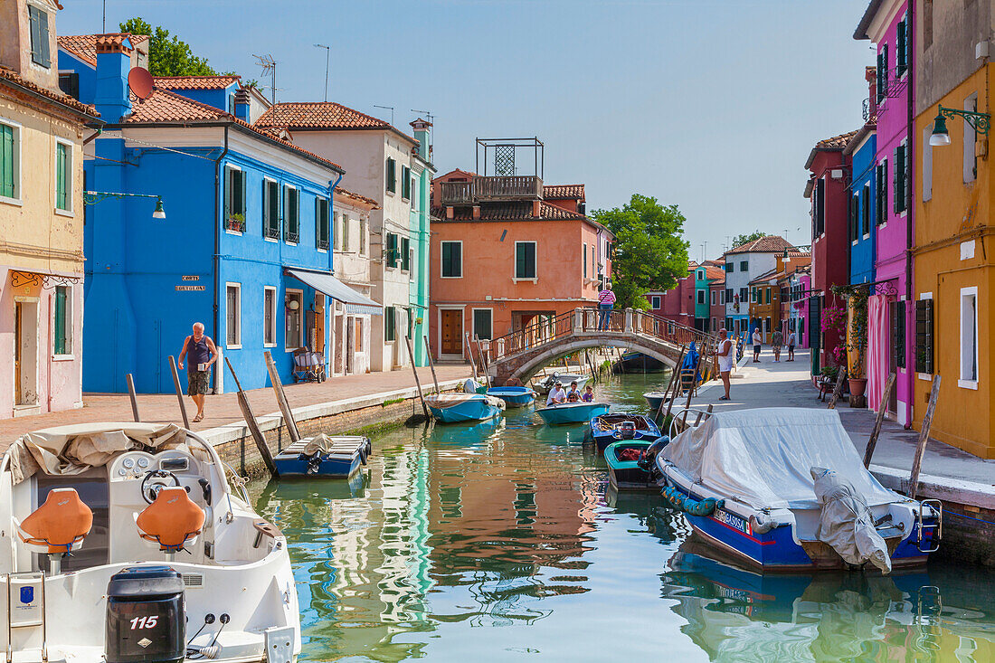 Classic view of the canal and colored houses in Burano. Venice, Veneto, Italy