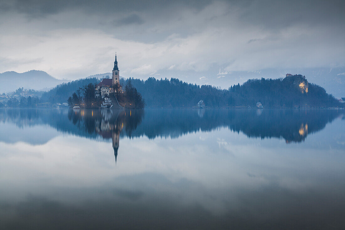 Europe, Slovenia, Upper Carniola. The lake of Bled in a rainy winter morning