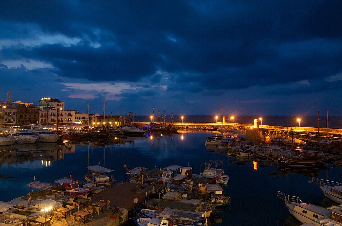 View of the harbour with evening lights of Kyrene,  Girne,  North Cyprus