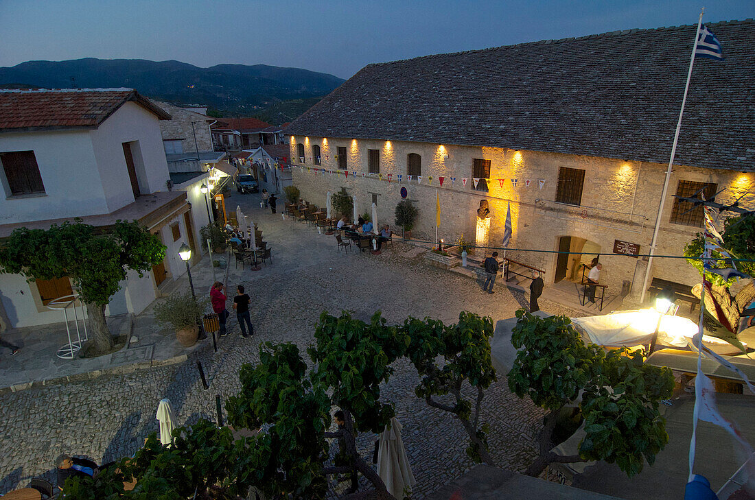 View of the Timios Stavros Monastery in Odomosfrom a rooftop in the evening, Cyprus