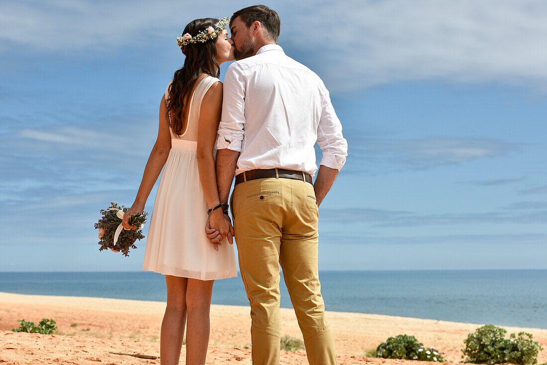 Wedding couple at the beach of  Vale do Lobo, Algarve, Portugal