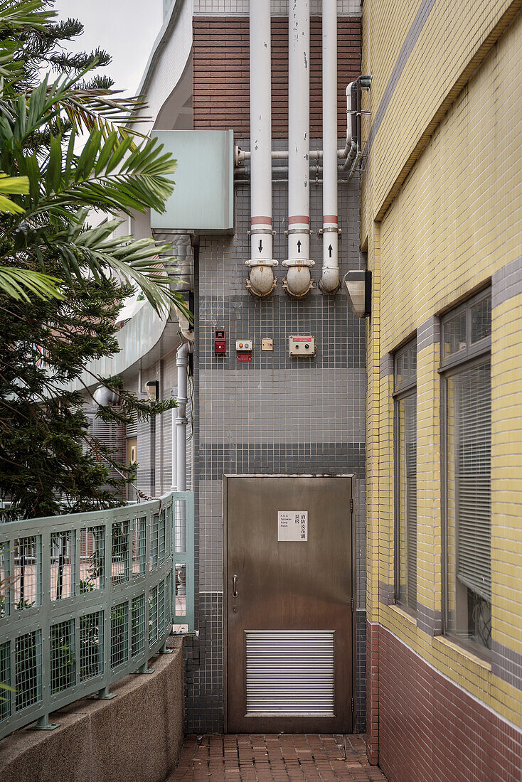 back door scene with pipes and tiles at Tin Shu Wai, Hongkong, China, Asia