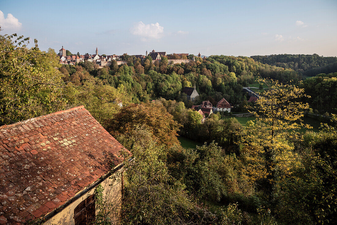 view across Tauber valley towards medieval town Rothenburg ob der Tauber, romantic Frakonia, Bavaria, Germany