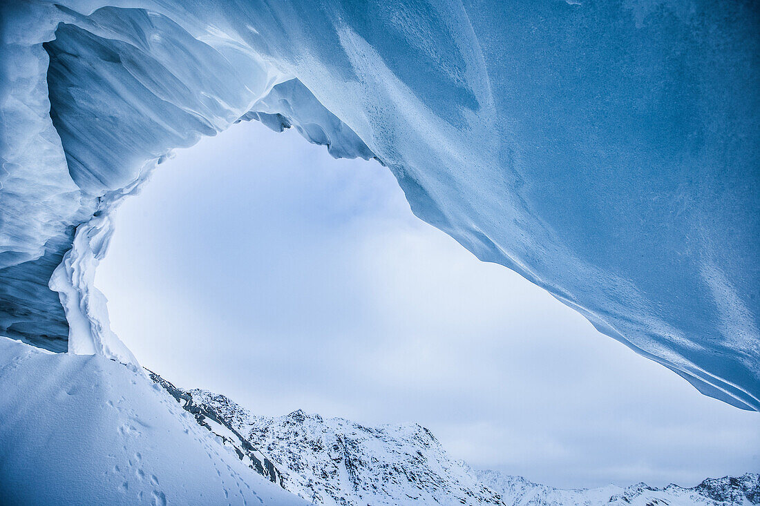 Cave of a glacier in the mountains, Pitztal, Tyrol, Austria