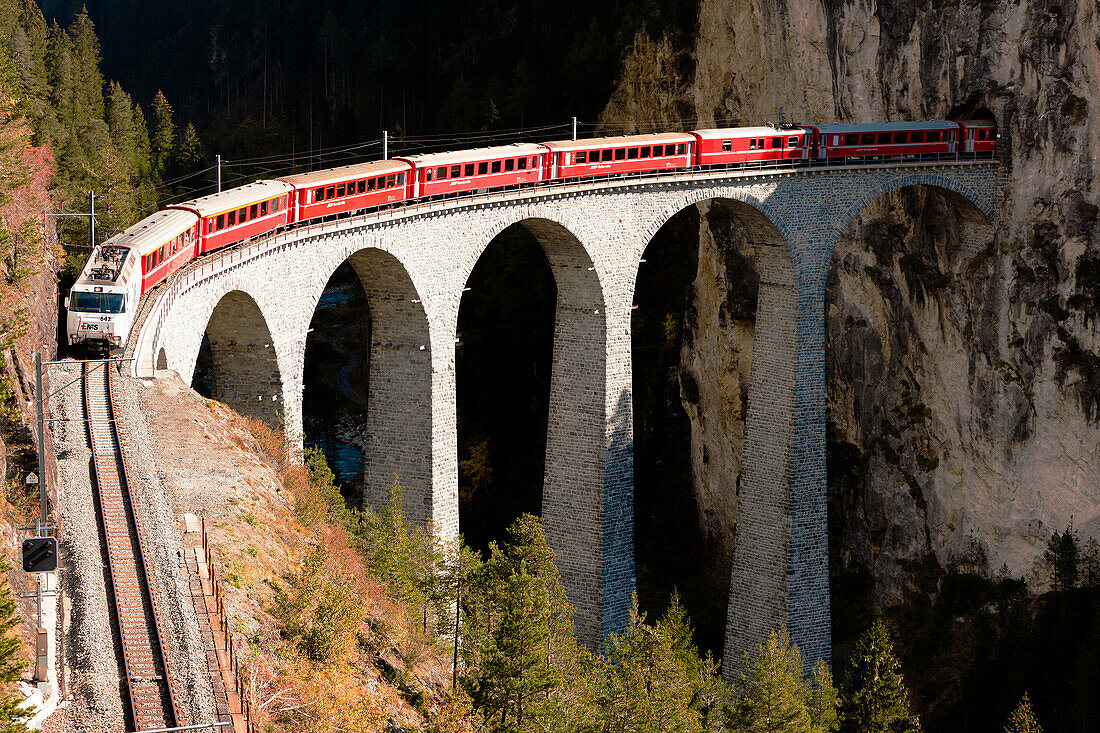 train on Rhaetian Railway, Landwasserviadukt, canton Graubunden, Switzerland.