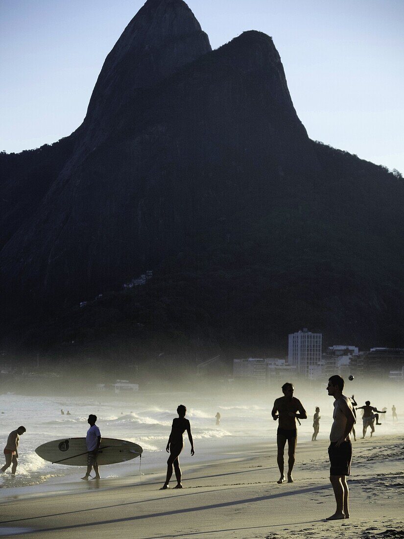 Tourists at the beach, Rio De Janeiro, Brazil.