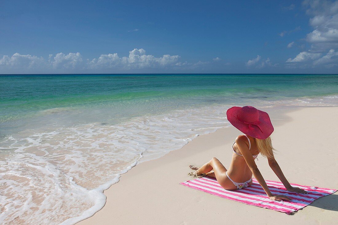 Young woman on the beach. Miami Beach, Florida, USA