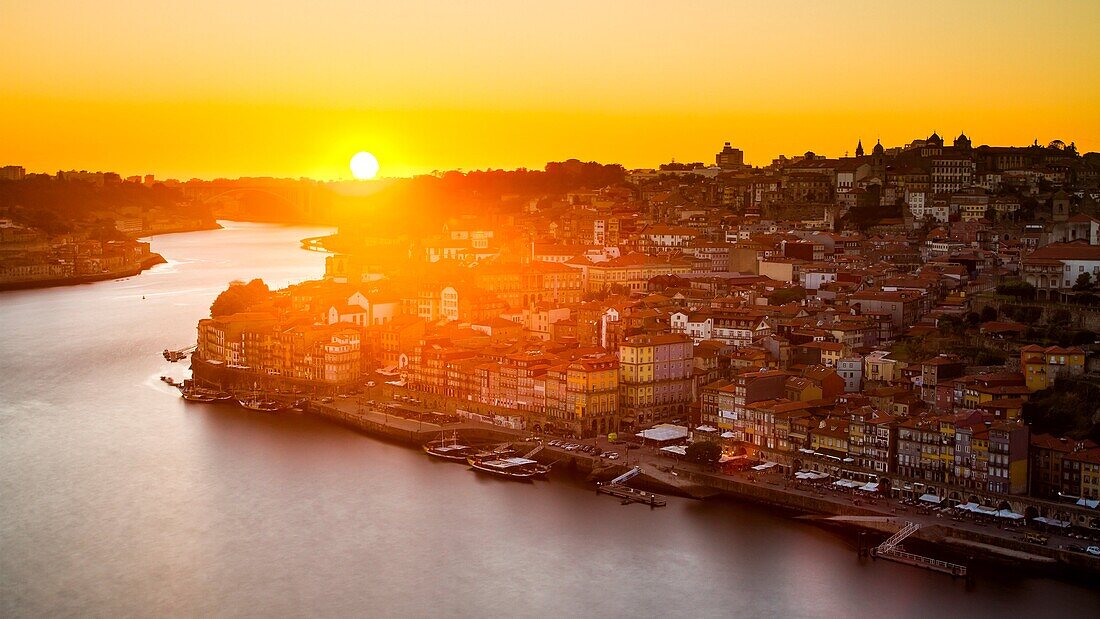 General view of Douro river and city of Oporto al sunset. Porto (Oporto), Portugal.