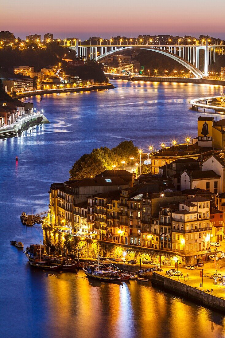 General view of Douro river and city of Oporto al sunset. Porto (Oporto), Portugal.