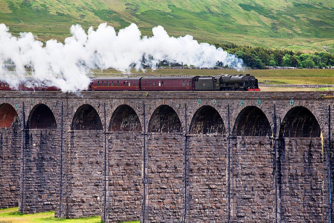 Steam Train Hauled by The Scots Guardsman Crossing the Ribblehead Viaduct Yorkshire Dales England.