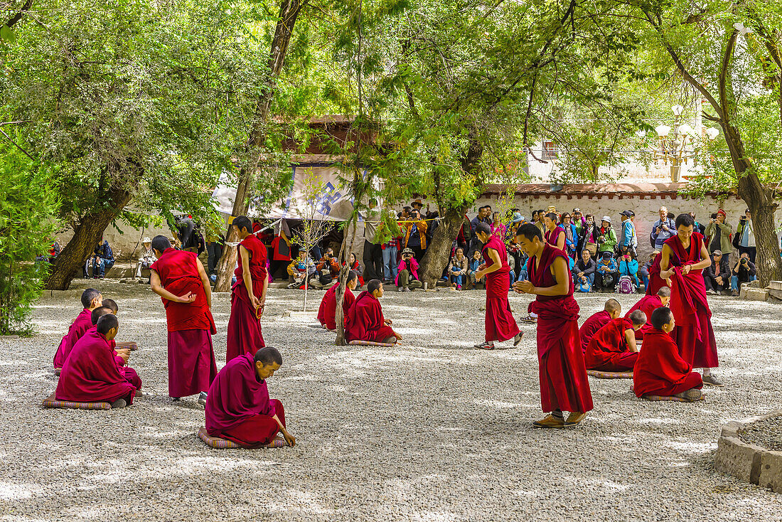 Monks debating Buddhist doctrines, Sera Monastery, Lhasa, Tibet (Xizang, China).