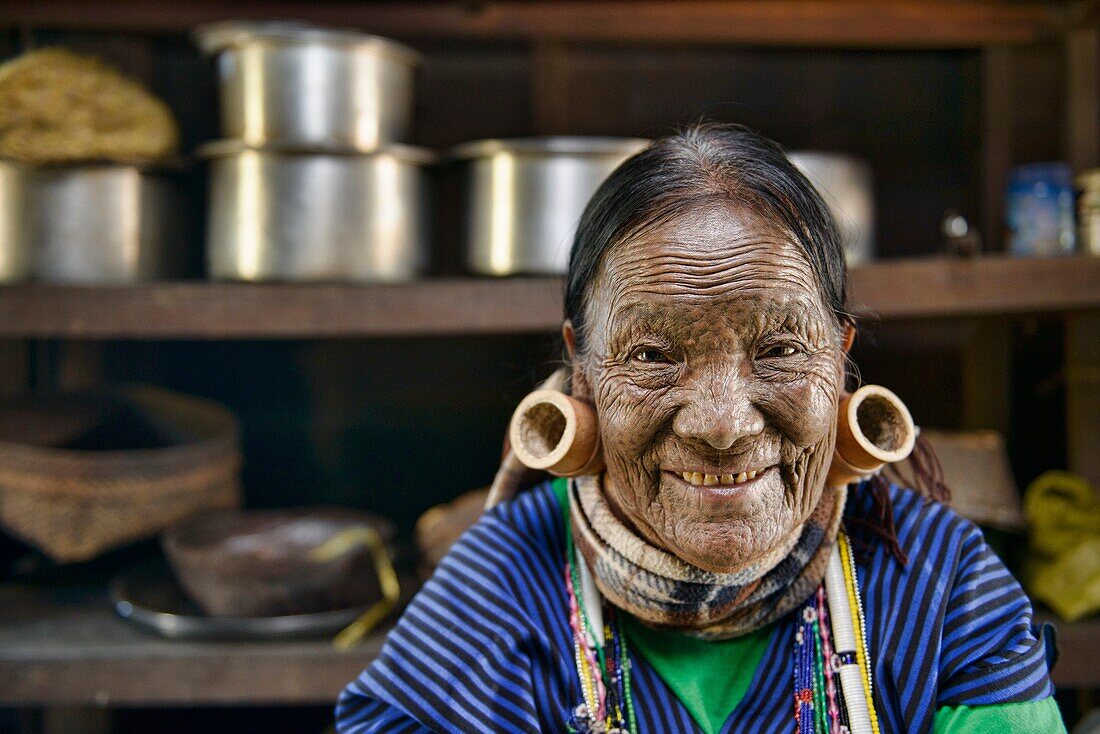 Hung Shen, 88 year old Magan Chin woman with face tattoos in Mindat, Myanmar. The tribal Chin women had their faces tattooed when they were around 15 years old, purportedly to protect them from being carried away by marauding men, and for beautification. 