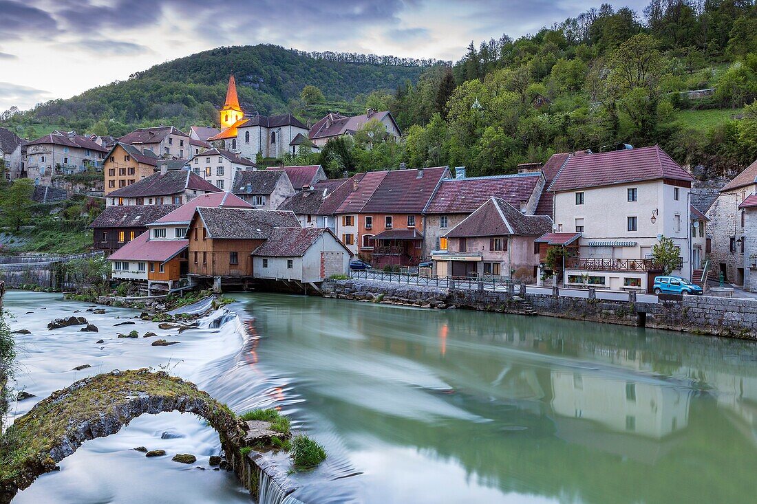 The weir and remains of a medieval bridge on the River Loue, Lods, Franche-Comté, France, Europe.