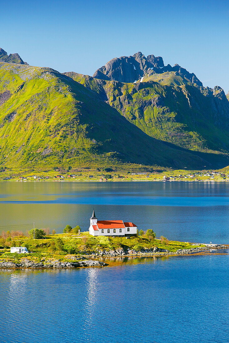Red church on Austnesfjord, Lofoten Islands, Norway.
