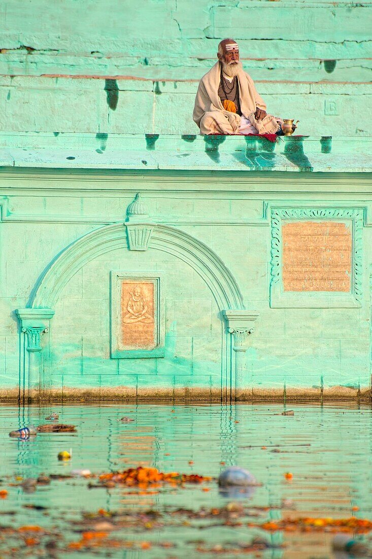 Holy man lingering the ghats of Varanasi.