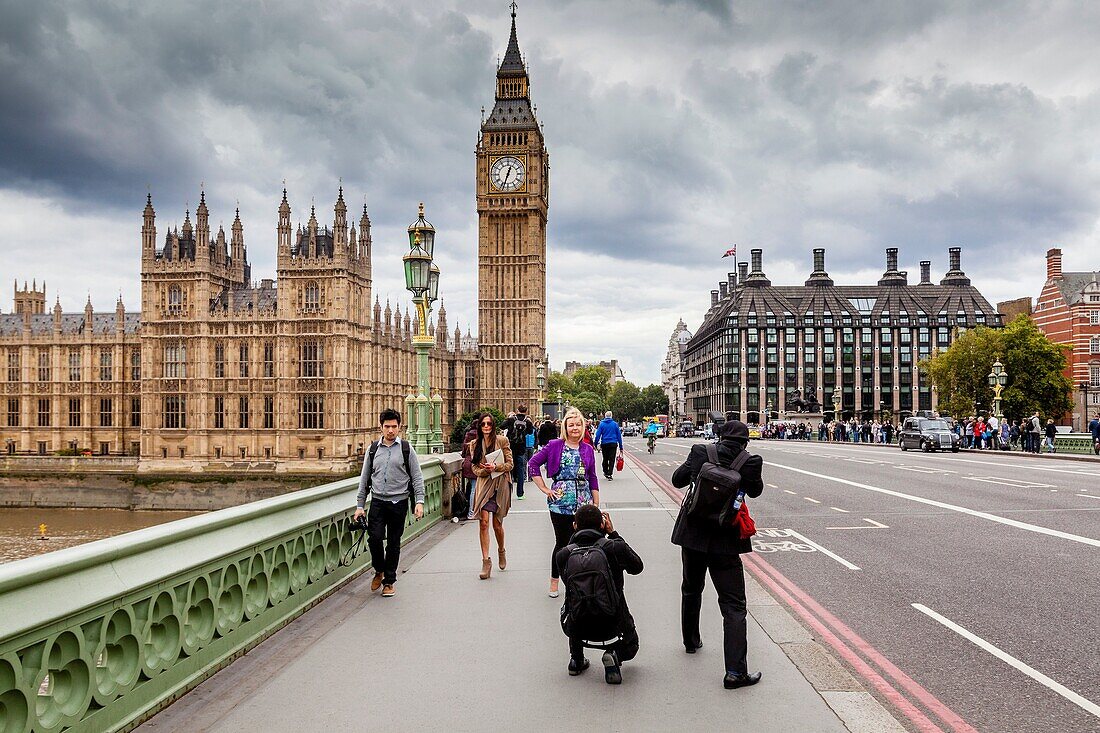 People Taking Photographs On Westminster Bridge, London, England.