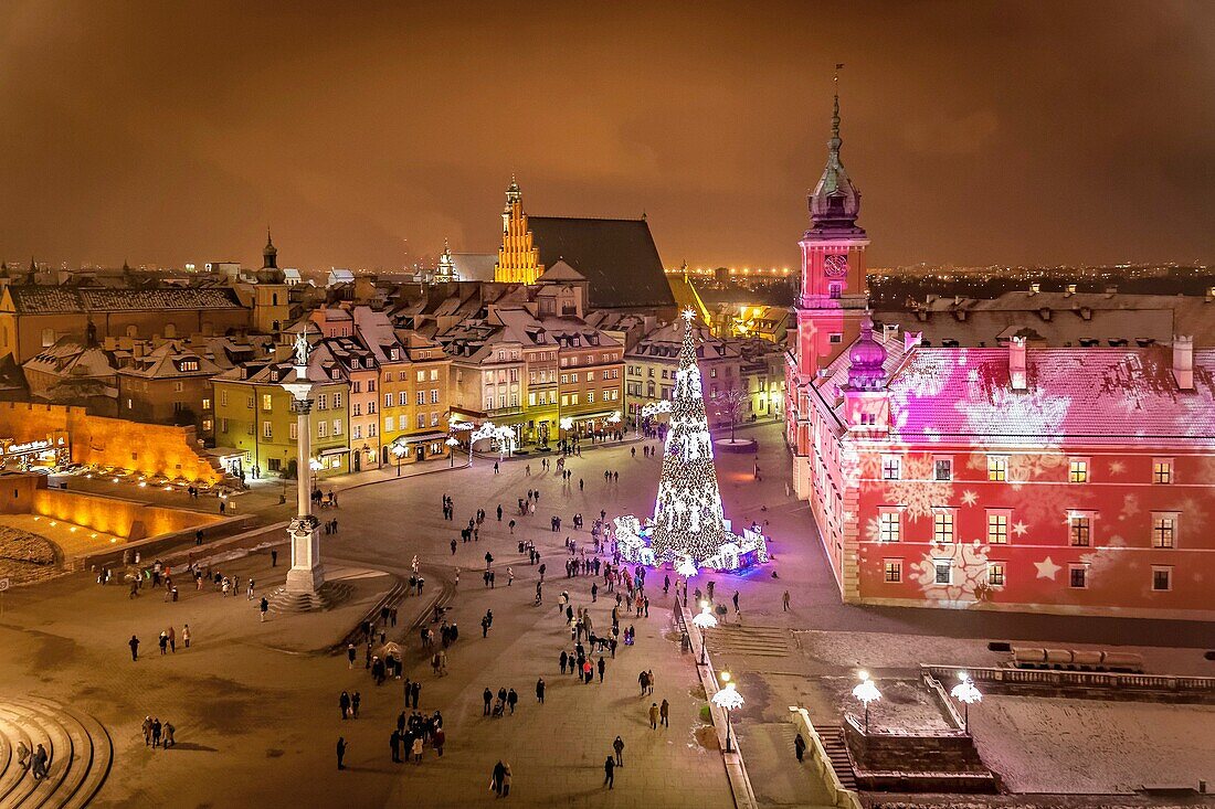Christmas illumination of Castle Square with Sigismund´s Column, Christmas tree and Royal Castle in the Old Town of Warsaw, Poland.