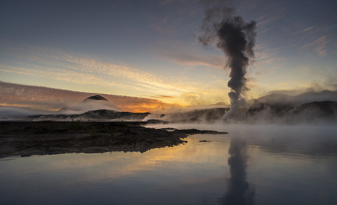 Steam and foggy landscape by The Bjarnarflag Geothermal Power Plant, Lake Myvatn area, Northern Iceland.