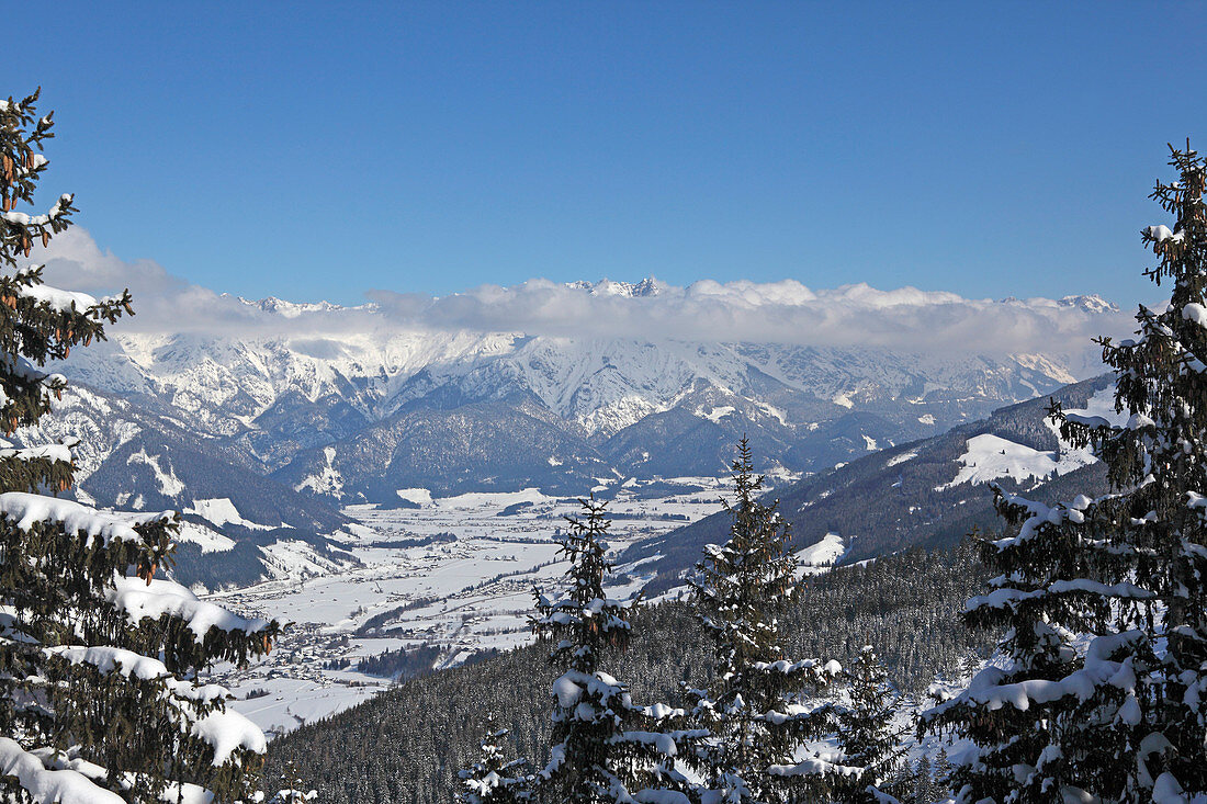 View from the Riederfeld downhill run over Saaletal valley and Saalfelden, Pinzgau, Salzburger Land