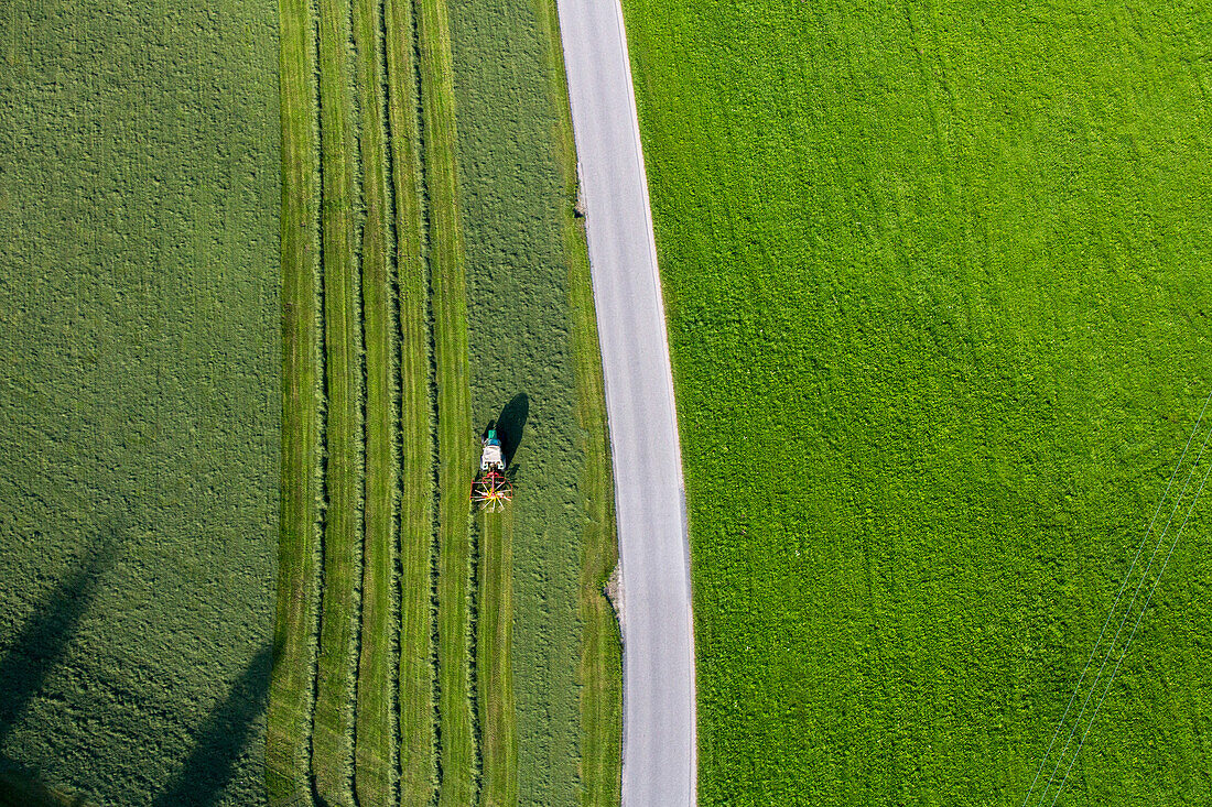 aerial, Kempten, tractor, working green fields, agriculural landscape, Bavaria, Germany