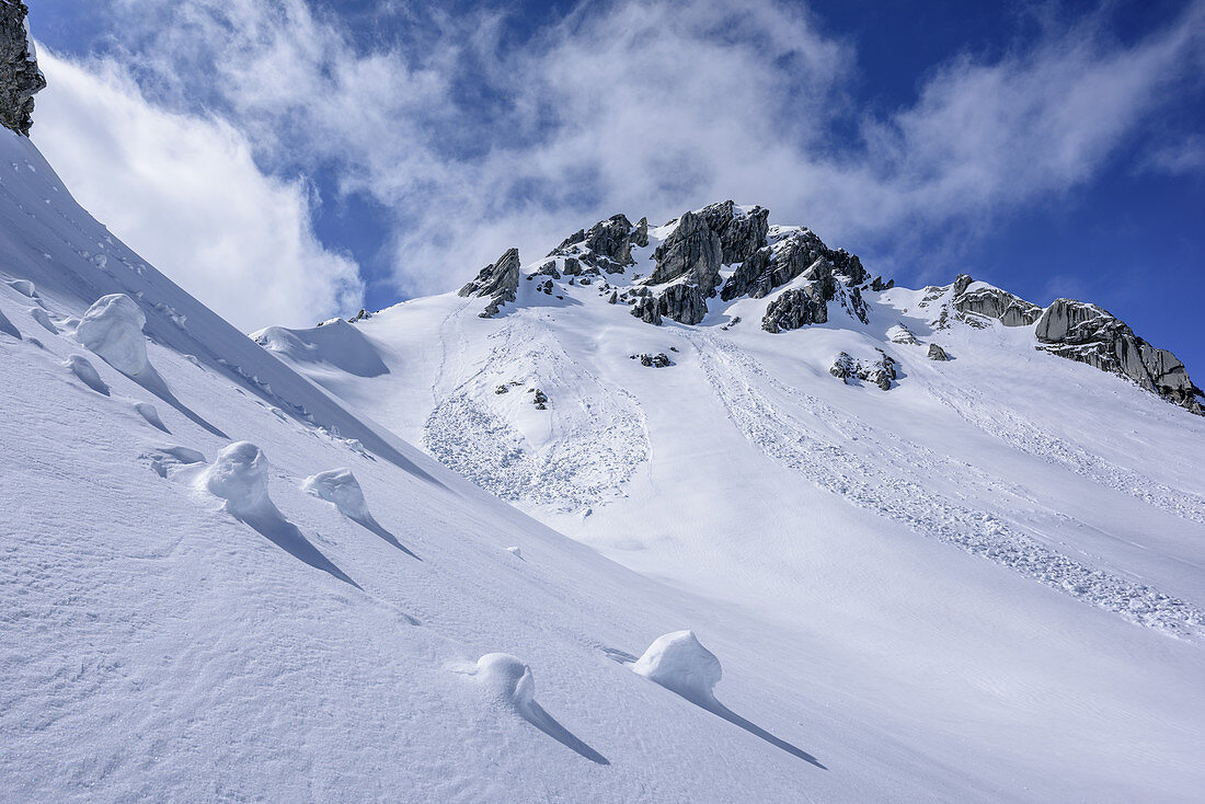 Avalanche snow in front of Roter Stein, Roter Stein, Fernpass, Lechtal Alps, Tyrol, Austria