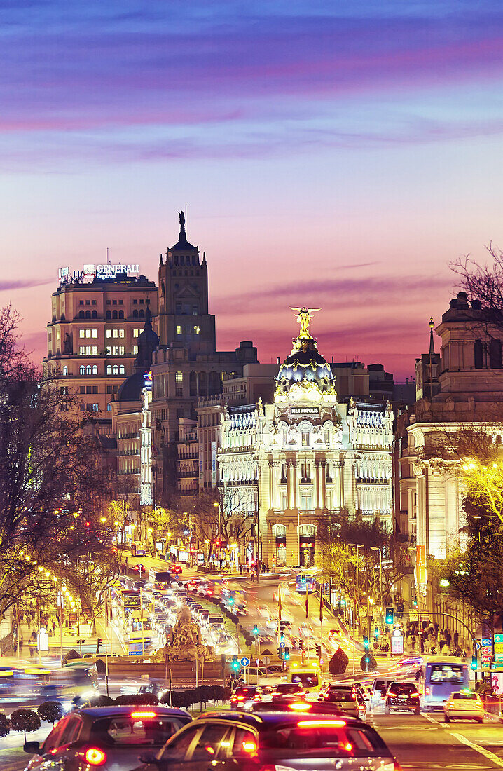 'Metropolis building seen from ''Puerta de Alcala'' monument by sunset. Madrid, Spain.'